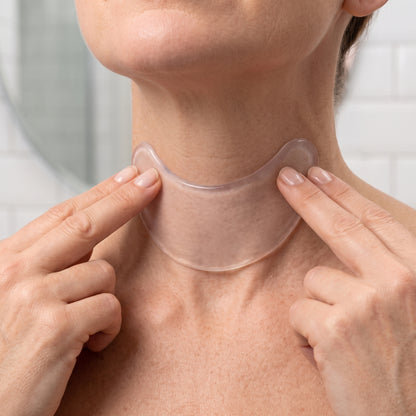 Smoothing the neck patch onto clean skin